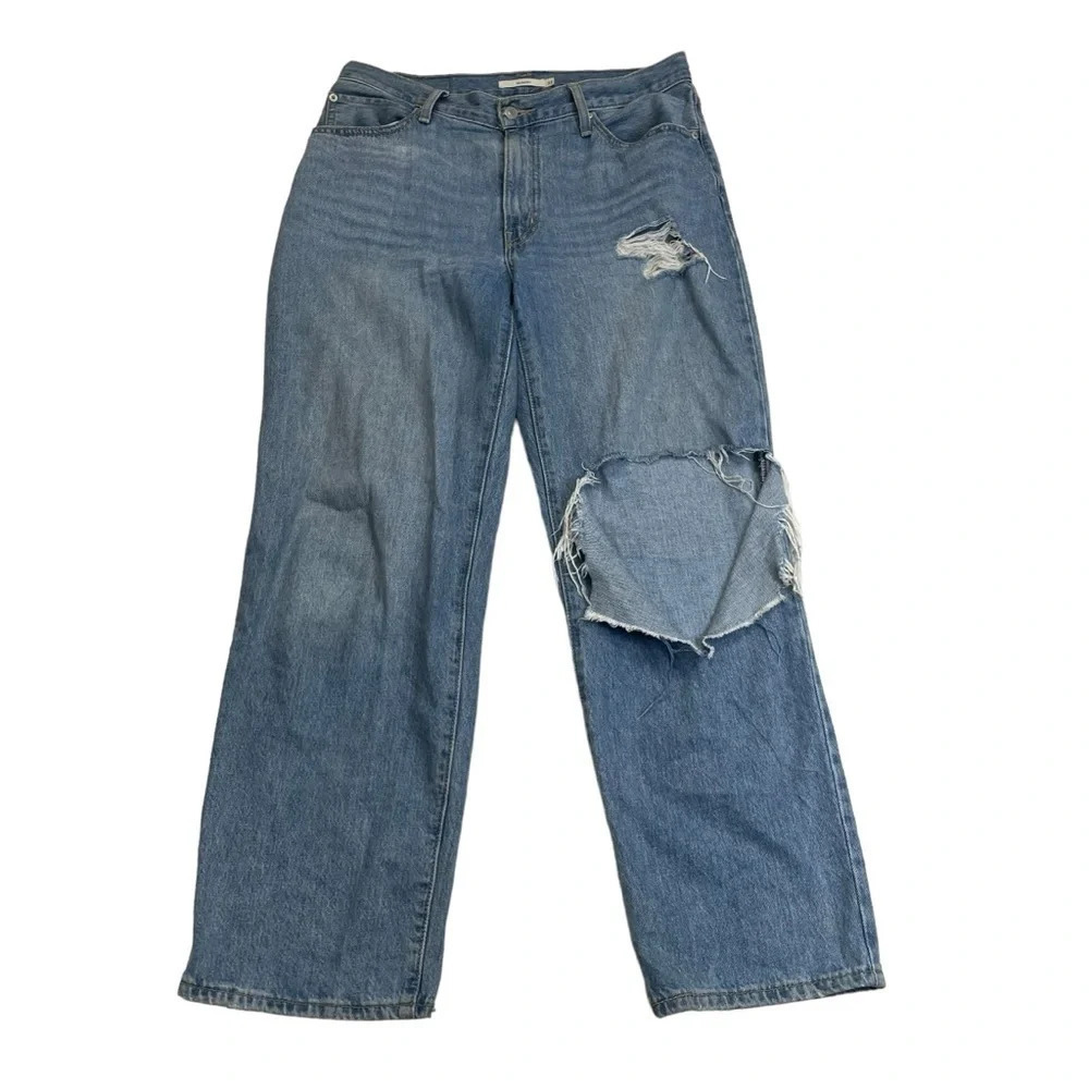 Levi’s 94 baggy jeans women’s size 31 huge tear in leg distressed grunge